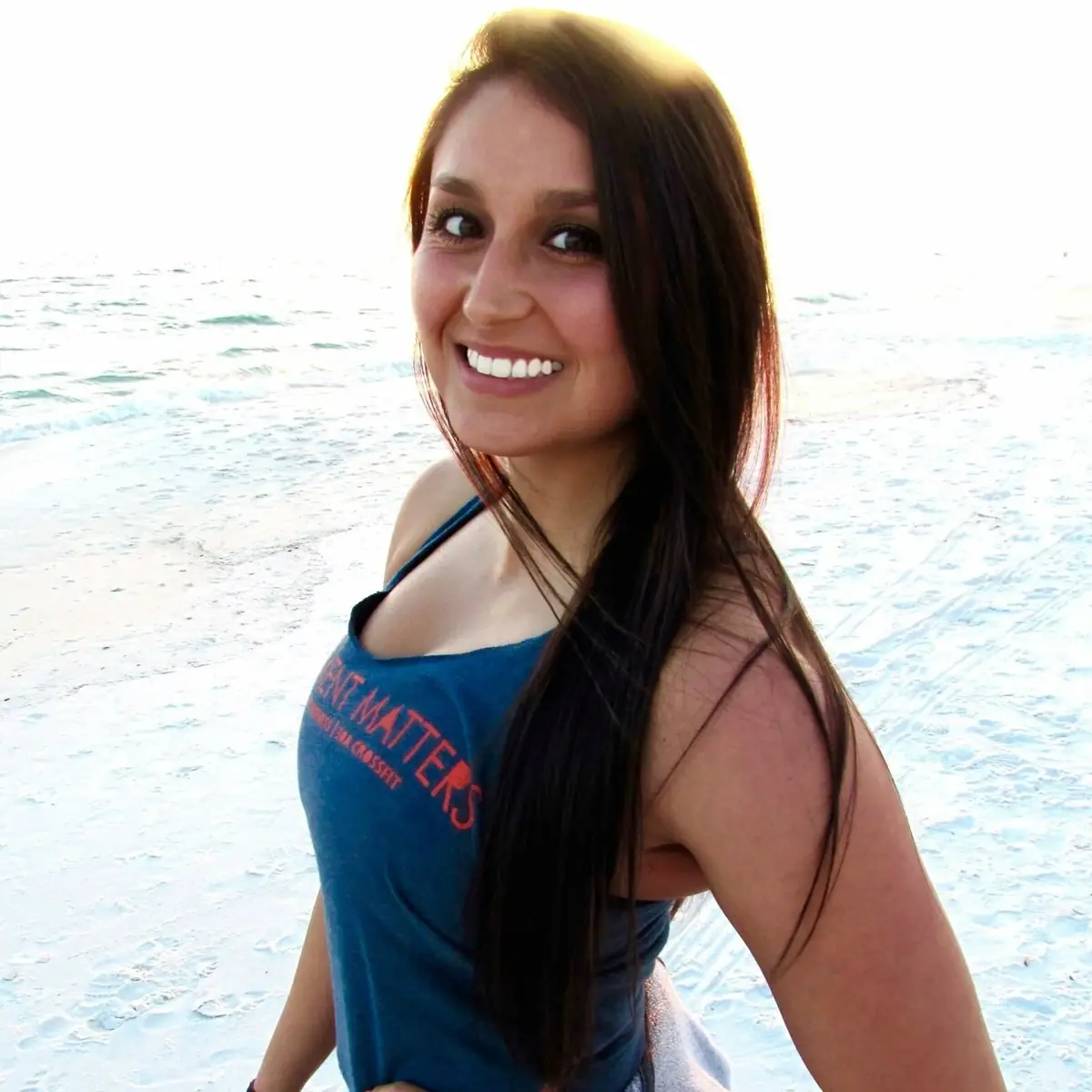 Jordan smiling on the beach