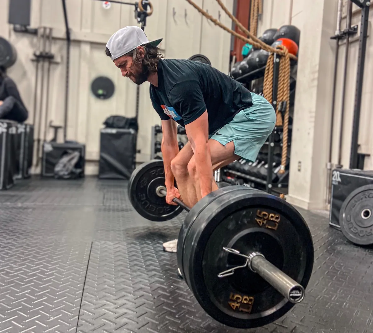 A member setting up a heavy deadlift